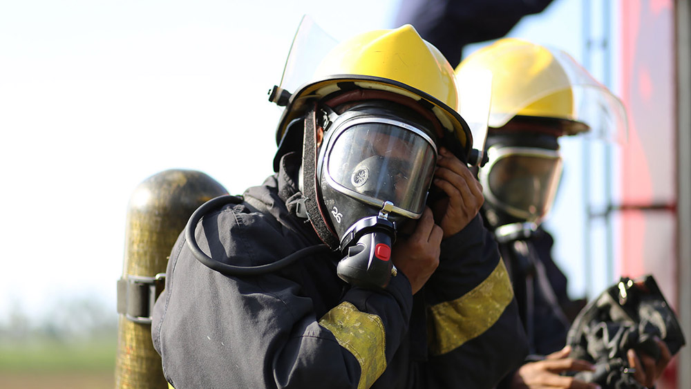 Fire fighters in full gear