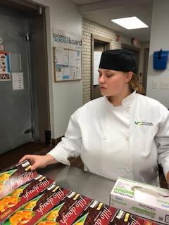 culinary student in a workplace kitchen